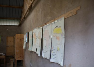 Maps of Africa on the wall inside a classroom at OLOG School Kenya