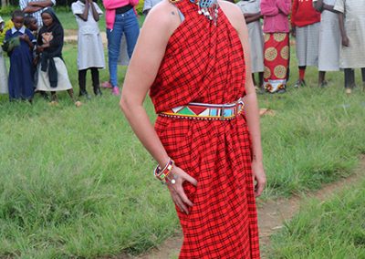 Volunteer Ashley Green wearing traditional dress and jewelry in celebration of International Women's Day 2020